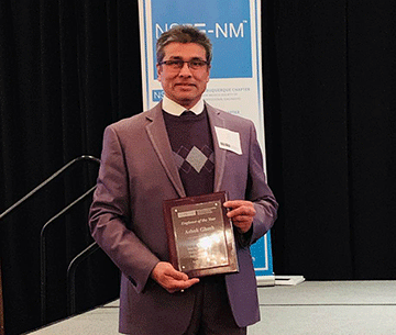 Ashok Ghosh with the plaque denoting Engineer of the Year